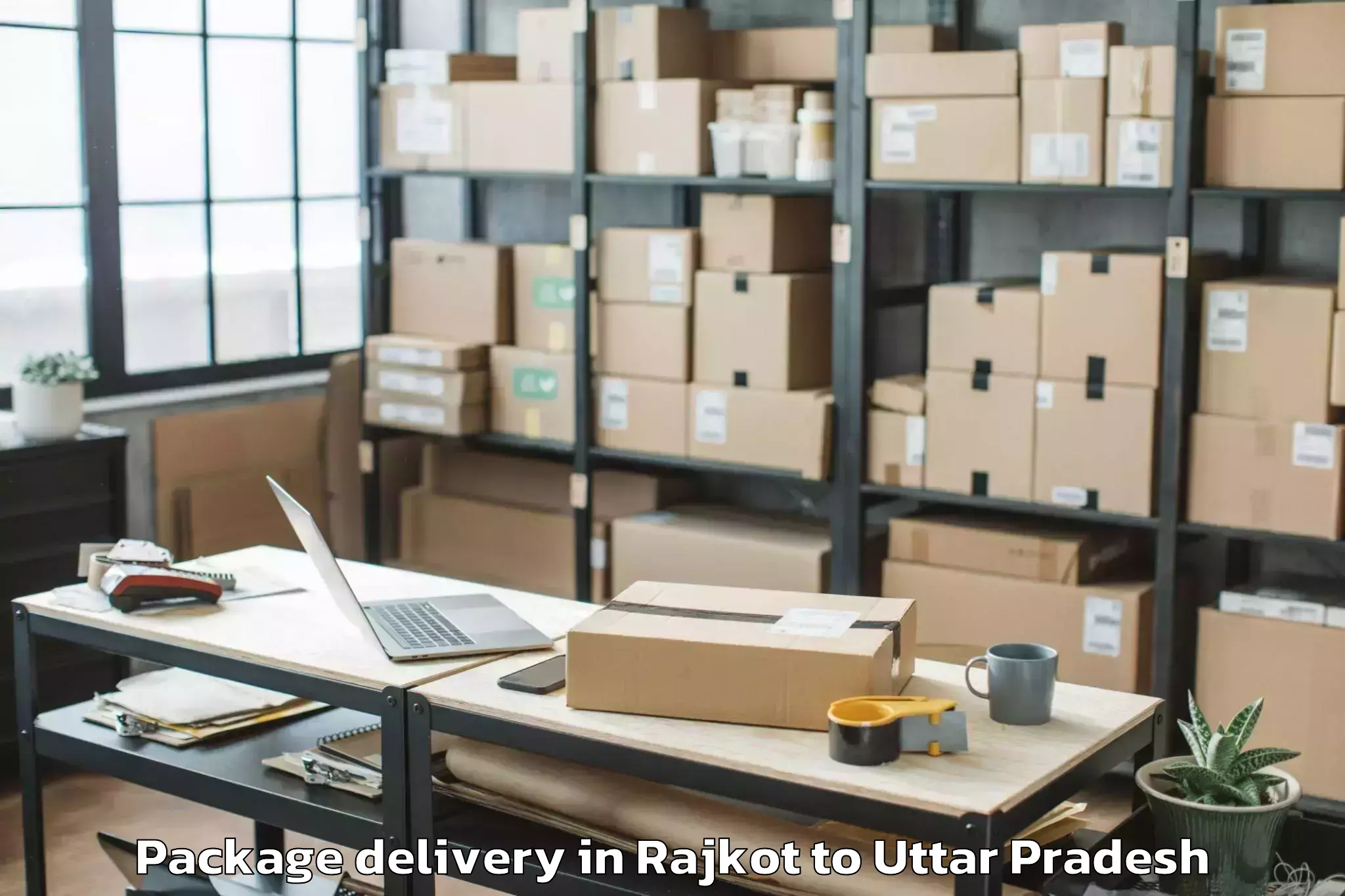 Top Rajkot to Monad University Hapur Package Delivery Available